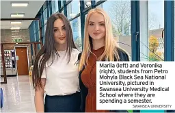  ?? SWANSEA UNIVERSITY ?? Mariia (left) and Veronika (right), students from Petro Mohyla Black Sea National University, pictured in Swansea University Medical School where they are spending a semester.