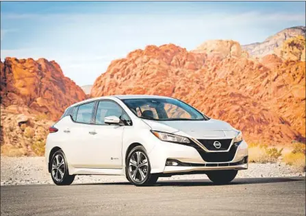  ?? Nissan ?? THE 2018 Nissan Leaf boasts sportier edges, helping it to look more like a car and less like a science experiment than previous models.