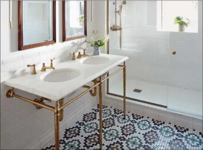  ?? Christophe­r Sturman ?? The intricate tile pattern for this master bath was created by senior designer Chelsie Lee of Jessica Helgerson Interior Design.