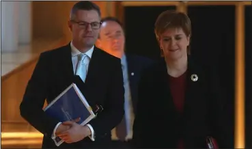  ??  ?? Finance Secretary Derek Mackay with First Minister Nicola Sturgeon