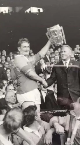  ??  ?? Wexford captain Dan Quigley raises the Liam MacCarthy Cup.