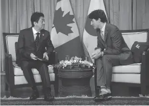  ?? ADRIAN WYLD / THE CANADIAN PRESS FILES ?? Justin Trudeau told Japanese PM Shinzo Abe at the APEC Summit in Vietnam last month that he wasn’t ready to move forward on the Trans-Pacific trade deal.