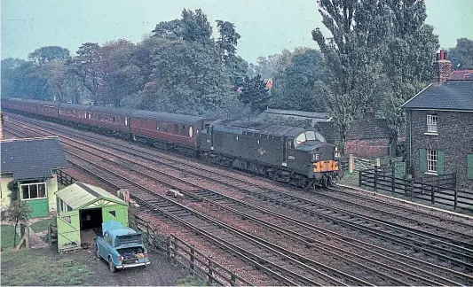  ?? JOHN FORD/COLLECTION DAVID FORD ?? No. 37714 began life as green-liveried No. D6724, the 25th-built EE Type 3 in August 1961. Five years later in October 1966, the split-box Series 1 machine is pictured in this superb period shot heading the 12.00pm Newcastle to Lincoln train at Chaloners Whin Junction, south of York.