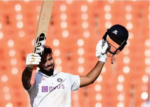  ?? Agence France-presse ?? ↑
India’s Rishabh Pant celebrates after scoring a century against England on the second day of their fourth Test at the Narendra Modi Stadium in Motera on Friday.