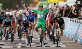  ?? Photograph: Stéphane Mahé/Reuters ?? Mark Cavendish celebrates after victory in stage 10 following a sprint finish into Valence, his 33rd Tour de France stage win.