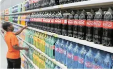 ?? ?? Not linked: Coca-Cola Beverages Africa was created in a 2016 merger, which was approved with conditions. The competitio­n watchdog argued that 2019 layoffs breached the conditions. /Reuters