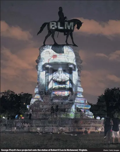  ?? Photo / Getty Images ?? George Floyd’s face projected onto the statue of Robert E Lee in Richmond, Virginia.