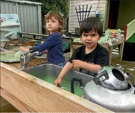  ?? SSUPPLIED ?? Millie Collinson, 2, Torin Lockley, 1, hard at work at Urenui Playcentre.