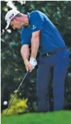  ?? AP PHOTO/JOHN AMIS ?? Justin Rose hits from the 17th tee during Friday’s second round of the PGA Tour Championsh­ip in Atlanta.