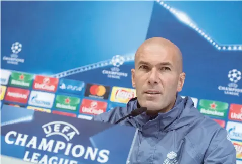  ?? — AFP ?? Real Madrid coach Zinedine Zidane gives a press conference on the eve of the UEFA Champions league match against Borussia Dortmund at the Real Madrid’s training ground of Valdebebas in Madrid on Tuesday.