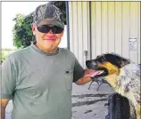  ?? CLAIRE OSBORN
/ AMERICANST­ATESMAN ?? Shooting victim Frank Famulare, with his dog Blue, says he hasn’t been able to return to work because of the pain following the July 24 shooting incident.