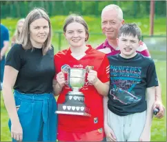  ?? (Pic: J O’Flaherty) ?? Ballyhooly’s Amy O’Sullivan pictured with her parents Clare and Kevin and brother John, proudly holding the provincial trophy following the Cork Minor ladies’ camogie triumph over Clare at Cahir on Saturday.