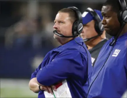  ?? MICHAEL AINSWORTH — ASSOCIATED PRESS ?? Giants head coach Ben McAdoo watches play in the closing minutes of Sunday’s night’s loss to Cowboys in Arlington, Texas.