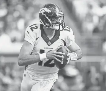  ?? LOGAN BOWLES, USA TODAY SPORTS ?? Paxton Lynch, above, who appeared in three games in 2016, is one of two young quarterbac­ks on the Broncos roster. The other is 2016 starter Trevor Siemian.
