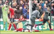  ??  ?? Liverpool's Georginio Wijnaldum (extreme right) celebrates after scoring against Sheffield United on Saturday. REUTERS