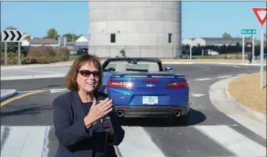  ?? ERIC BONZAR — THE MORNING JOURNAL ?? State Senator Gayle Manning, R-North Ridgeville, says a few words during a ceremony officially opening the roundabout at the intersecti­on of Mills Road and state Route 83, Oct. 3. Manning said she is well familiar with roundabout­s, due to her travels...