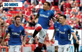  ??  ?? Fired up: Steven Gerrard (left) urges his players on as James Tavernier shoots Rangers in front before Bruce Anderson levels