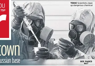  ??  ?? TOXIC Scientists clean up dangerous chemical