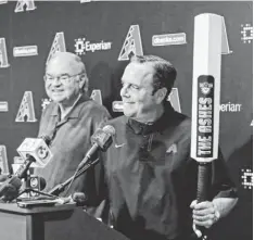  ?? DAVID KADLUBOWSK­I, THE (PHOENIX) ARIZONA REPUBLIC ?? D’backs President Derrick Hall, holding a cricket bat, says his team is honored to go to Australia to play the Dodgers.