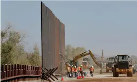  ?? Photograph: Matt York/ AP ?? Border wall constructi­on along the Colorado River toppled saguaro cactuses, put endangered ocelots at risk and disturbed Native American burial grounds.