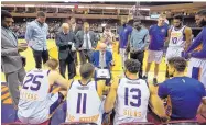  ?? CHRIS COSTELL FILE PHOTO VIA CODY TOPPERT ?? Albuquerqu­e Academy alum Cody Toppert, center, shown coaching the Northern Arizona Suns of the NBA G League, will be a sideline boss in The Basketball Tournament.