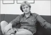  ?? RICHARD DREW — THE ASSOCIATED PRESS FILE ?? David McCallum, star of the NBC-TV series “The Invisible Man,” is shown during an interview with Jay Sharbutt at NBC studios in New York on Aug. 28, 1975.