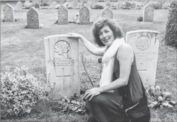  ?? CONTRIBUTE­D ?? Rhonda McLean, the grand-niece of George Price, visits his grave site in St. Symphorien Military Cemetery near the hamlet of Ville-sur-Haine, Belgium.