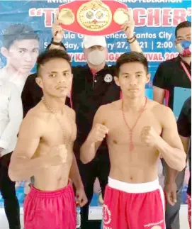  ?? PHOTOGRAPH COURTESY OF ART MONIS ?? PEDRO Taduran (right) defends his IBF minimumwei­ght title when he faces Rene Cuarto in General Santos City.