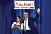  ?? ASSOCIATED PRESS ?? Former Vice President Mike Pence and wife Karen at Wednesday’s event in Iowa during which the former vice president announced he’s challengin­g Donald Trump for the Republican nomination for president.