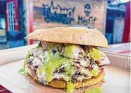  ?? J.C. Reid / Contributo­r ?? Pork belly torta at Misfit Outpost