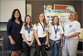  ?? SUBMITTED ?? Pictured from left, are NOPEC Relationsh­ip Manager Genny Costanzo, West Geauga students: Myra Utterback, Isla Mancino, Hazel Gintert and teacher Anna Laubscher.