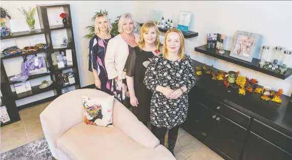  ?? LIAM RICHARDS ?? Rita Bzowy-girling, from back left, Anita Johanson, Julie Rozek and April Sitarz expanded their business into a new, larger space to meet rising demand for laser treatments.
