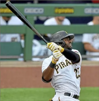  ?? Matt Freed/Post-Gazette ?? Gregory Polanco watches his two-run home run sail over the fence in right-center field in eighth inning, giving the Pirates a 5-4 lead on the Brewers. the