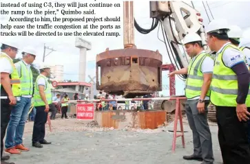  ?? ANALY LABOR @tribunephl_ana ?? DEPARTMENT of Public Works and Highway Secretary Mark Villar together with the North Luzon Expressway (NLEX) Corp. COO Raul Ignacio, vice president for Tollway developmen­t and engineerin­g Nemesio Castillo and other officials inspect the constructi­on site of NLEX Harbor link segment 10 C3-R10 Malabon skyway project.