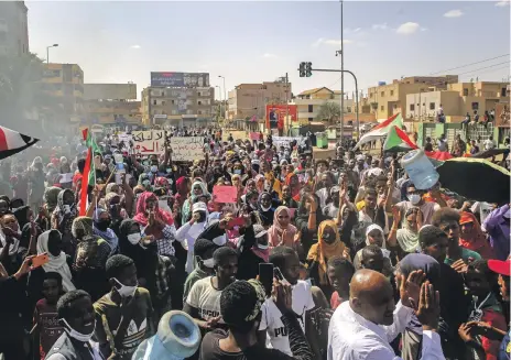  ?? EPA ?? In Khartoum, demonstrat­ors shout slogans and wave Sudanese flags as a part of nationwide protest against a military takeover