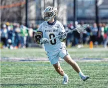  ?? Michael Miller/ISI Photos/Getty Images ?? Notre Dame’s Jeffrey Ricciardel­li, of New Canaan/Taft, runs with the ball during a game against Syracuse at Arlotta Stadium on March 30 in South Bend, Ind.