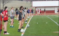  ?? Daniel Bereznicki/McDonald County Press ?? On Feb. 26, students lined up during the first week of soccer practice to try out for the Lady Mustang Soccer team.