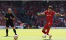  ?? Images ?? Dominik Szoboszlai scores Liverpool’s opening goal and his first for the club, as well as the 900th scored under Klopp in all competitio­ns. Photograph: Matt McNulty/Getty