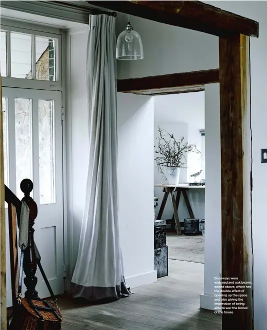  ??  ?? Doorways were widened and oak beams added above, which has the double effect of opening up the space and also giving the impression of being able to see ‘the bones’ of the house