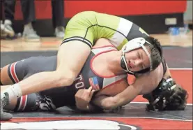  ?? Special ?? Cedartown’s Gage Mason tries to break free of a hold by Rockmart’s Bleu Winters during the pair’s 138-pound match on Dec. 16 at Cedartown High School.