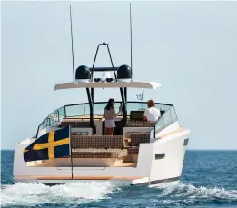  ??  ?? clockwise from right:
The Swedish builder produces modern, stylish boats with Scandinavi­an-inspired lines; The helm has dual seats port and starboard and a Garmin glass cockpit system; The boat’s generous deck space is outfitted with creature comforts...