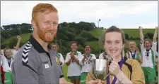  ??  ?? Michaela Kennedy receiving the cup from Barry Dempsey.