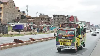  ?? DONG JIANGHUI / XINHUA ?? Vehicles run on the Nairobi Eastern Bypass in the Kenyan capital on Sunday.