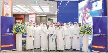  ??  ?? ↑
Officials during the opening of the Sharjah Islamic Bank’s 35th branch in Rahmania Mall.