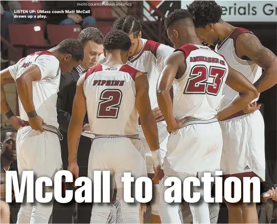  ?? PHOTO COURTESY UMASS ATHLETICS ?? LISTEN UP: UMass coach Matt McCall draws up a play.