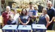  ??  ?? Three families who have experience­d stillbirth are helping others with the gift of cuddle cots. They help bereaved parents spend time with their babies