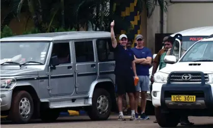  ??  ?? John Armstrong (left) gestures next to Nicholas Simpson as they leave prison in Chennai on Tuesday. Photograph: Arun Sankar/AFP/Getty Images