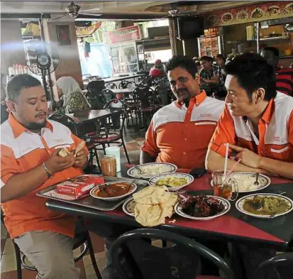  ??  ?? Hungry for laughs: Afdlin Shauki (Saadom), Adham Malekh (Ali) and Pete Teo (Alan) in a scene from Papadom 2.