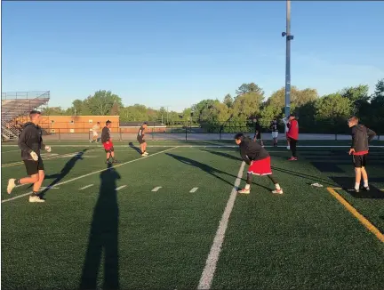  ?? COURTESY MITCH HEWITT ?? Chardon players prepare for a drill during workouts on June 1.