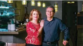  ?? PHOTOS BY JASON GETZ / AJC 2017 ?? Noosh Kitchen owners Nooshin Yazdani and her husband Saeid Ghaemi are shown in their Northside family restaurant last year.